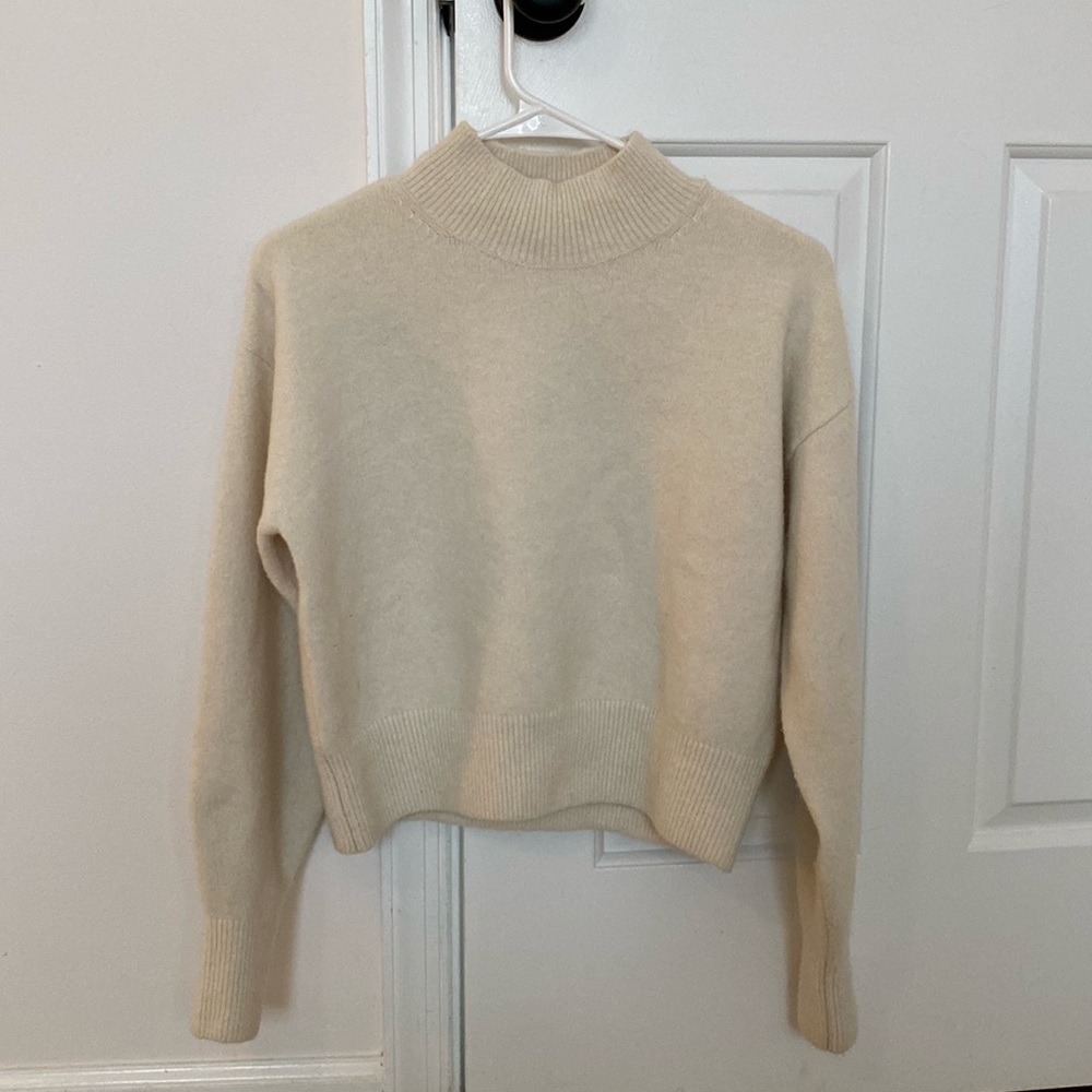 & other stories cream and black sweater